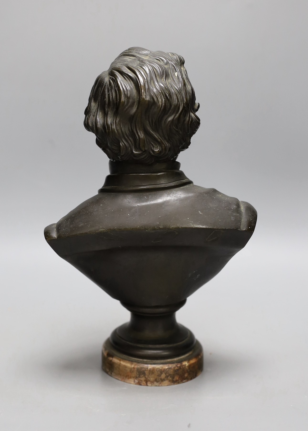 A 19th century cast bronze bust of Disraeli, 30cms high